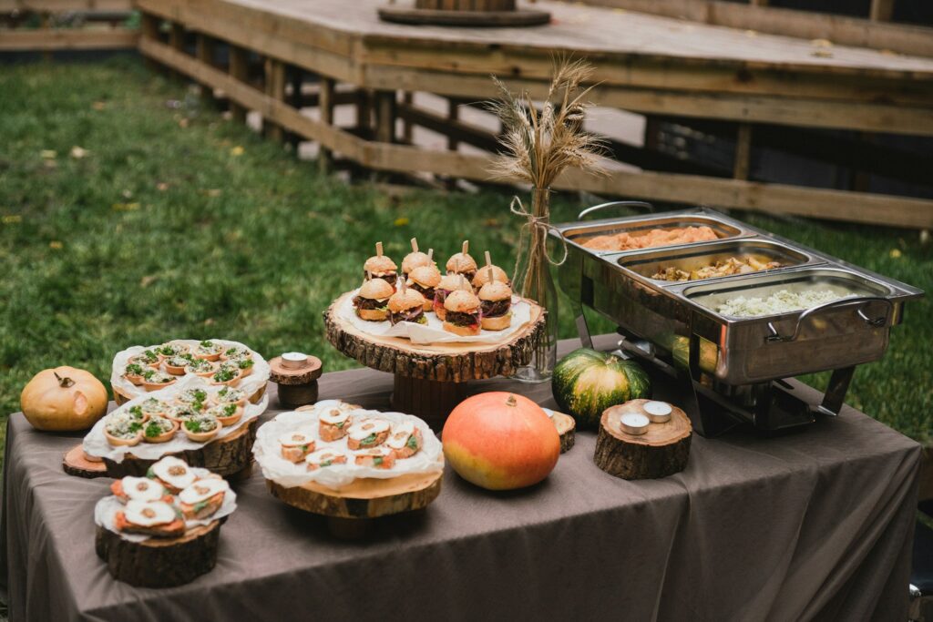 Catering banquet table at the reception. Casual wedding party.