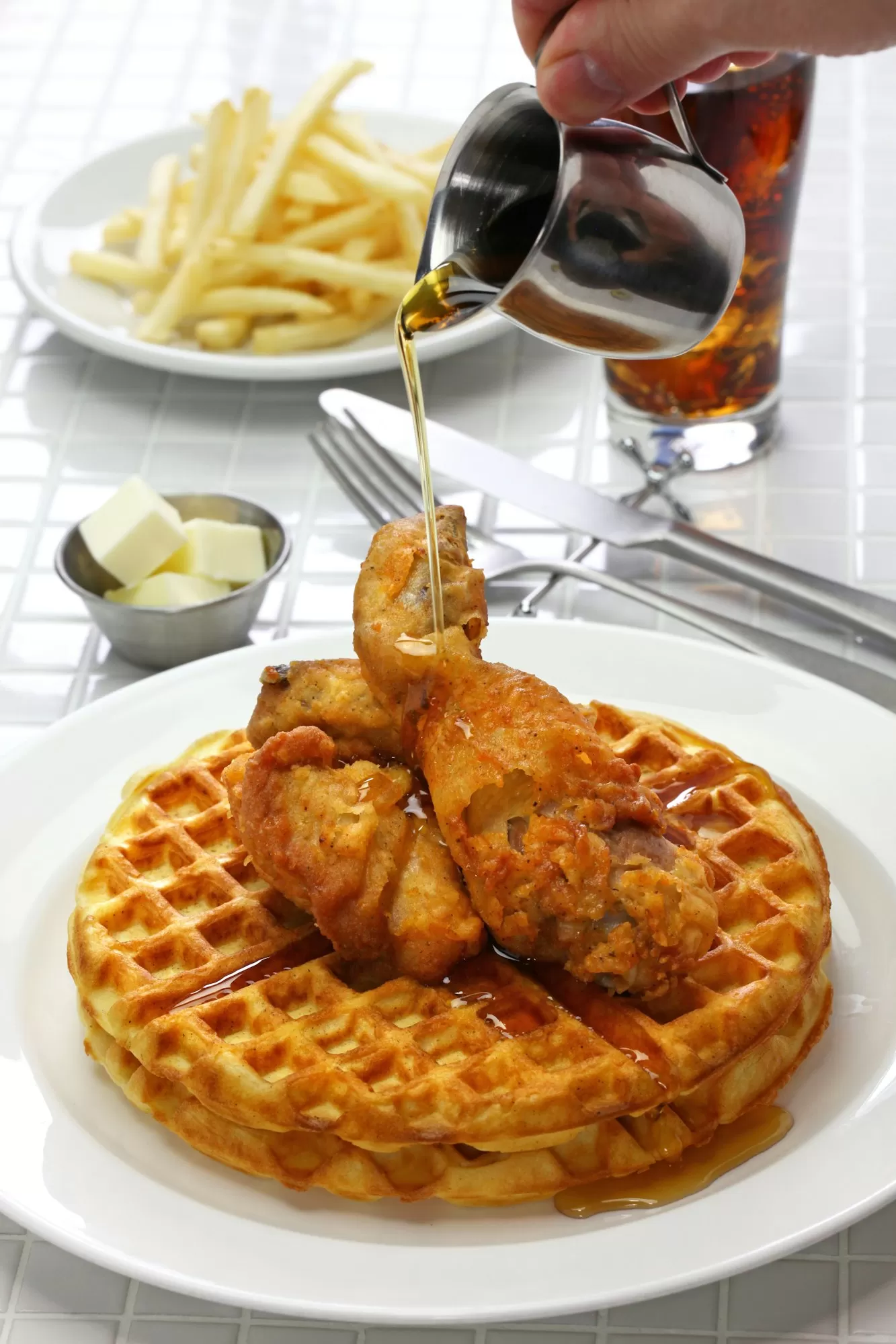 fried chicken and waffles with maple syrup, american food